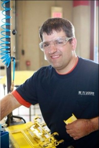 A person supported by Development Homes at work